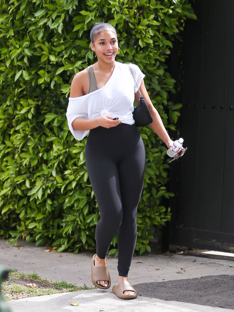 Lori Harvey wears Lululemon Align Pants for her workouts. (Image via Getty Images)