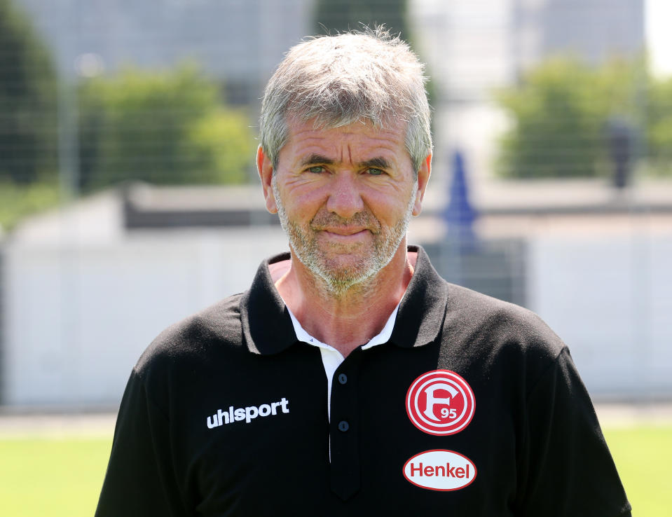 File - In this Friday, July 13, 2018 photo Friedhelm Funkel, head coach of the German first division, Bundesliga, soccer team Fortuna Duesseldorf, poses during the official season's photo call in Duesseldorf, Germany. (Roland Weihrauch/dpa via AP, file)