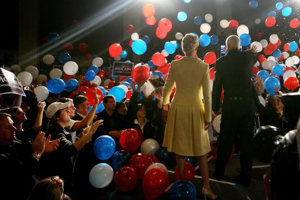 Sen. John McCain and wife Cindy greet supporters at a campaign rally at the Fairmont Dallas hotel on March 4, 2008.