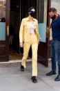 <p><strong>May 2021 </strong>Kendall Jenner put a casual twist on the suit on a yellow denim number. </p>