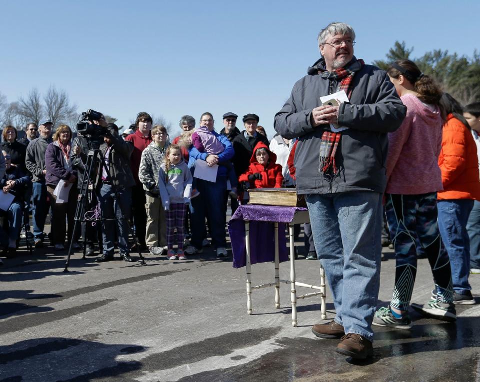 The 150-year-old Bible sitting on the table survived two church fires. "It's a great testament to our faith that stands strong even in the midst of this (fire)," said Pastor Tim O'Brien, who led a vigil outside the Springs — United Methodist Church in Plover, Wisconsin, on on Tuesday, March 19, 2019.
