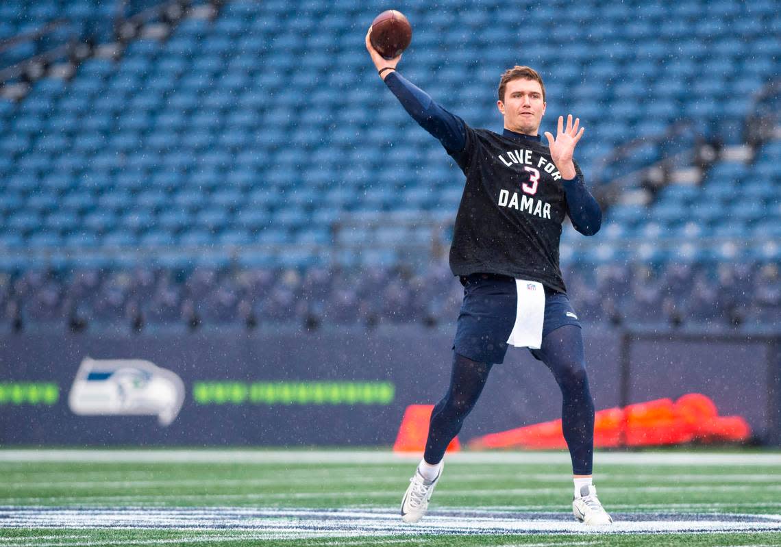 Seattle Seahawks quarterback Drew Lock (2) throws the ball while warming up before the start of an NFL game against the Los Angeles Rams at Lumen Field in Seattle, Wash. on Jan. 8, 2023.