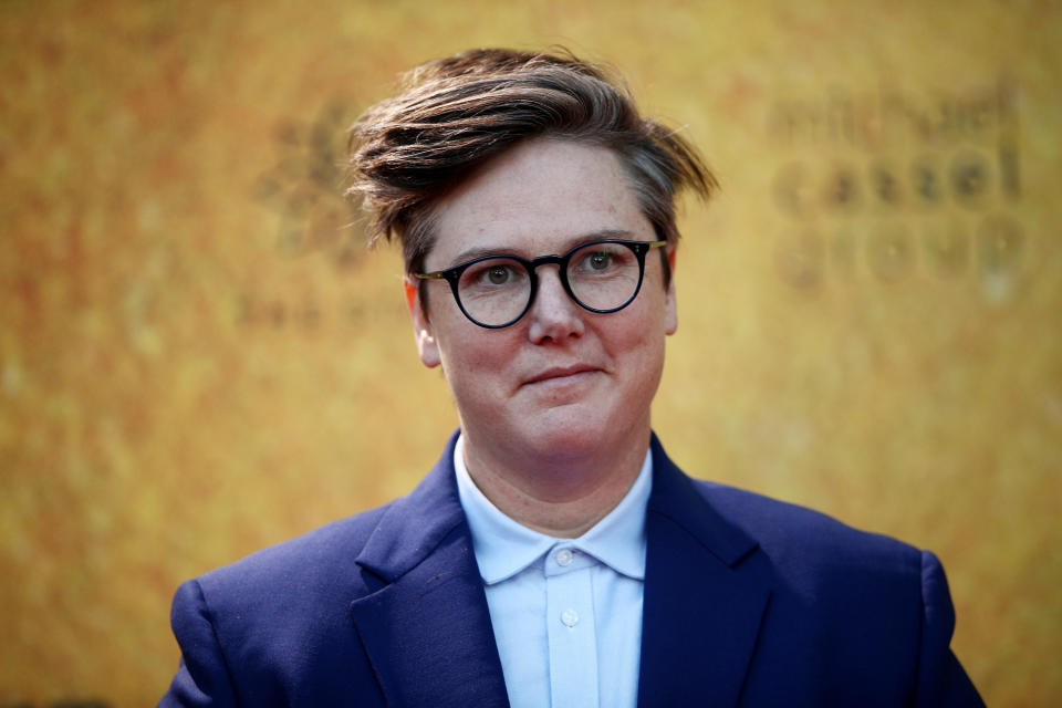 Hannah Gadsby in a blue suit