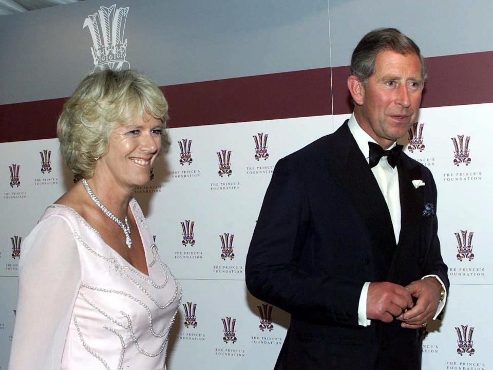 BRITAIN CHARLES CAMILLA Britain Prince Charles of Wales and Camilla Parker Bowles walk through to The Gala Dinner at The Prince's Foundation in London, Tuesday June 20, 2000. Camilla Parker Bowles accompanied the prince to the dinner which marks the official opening of the newly restored building which is the headquarters of the foundation.