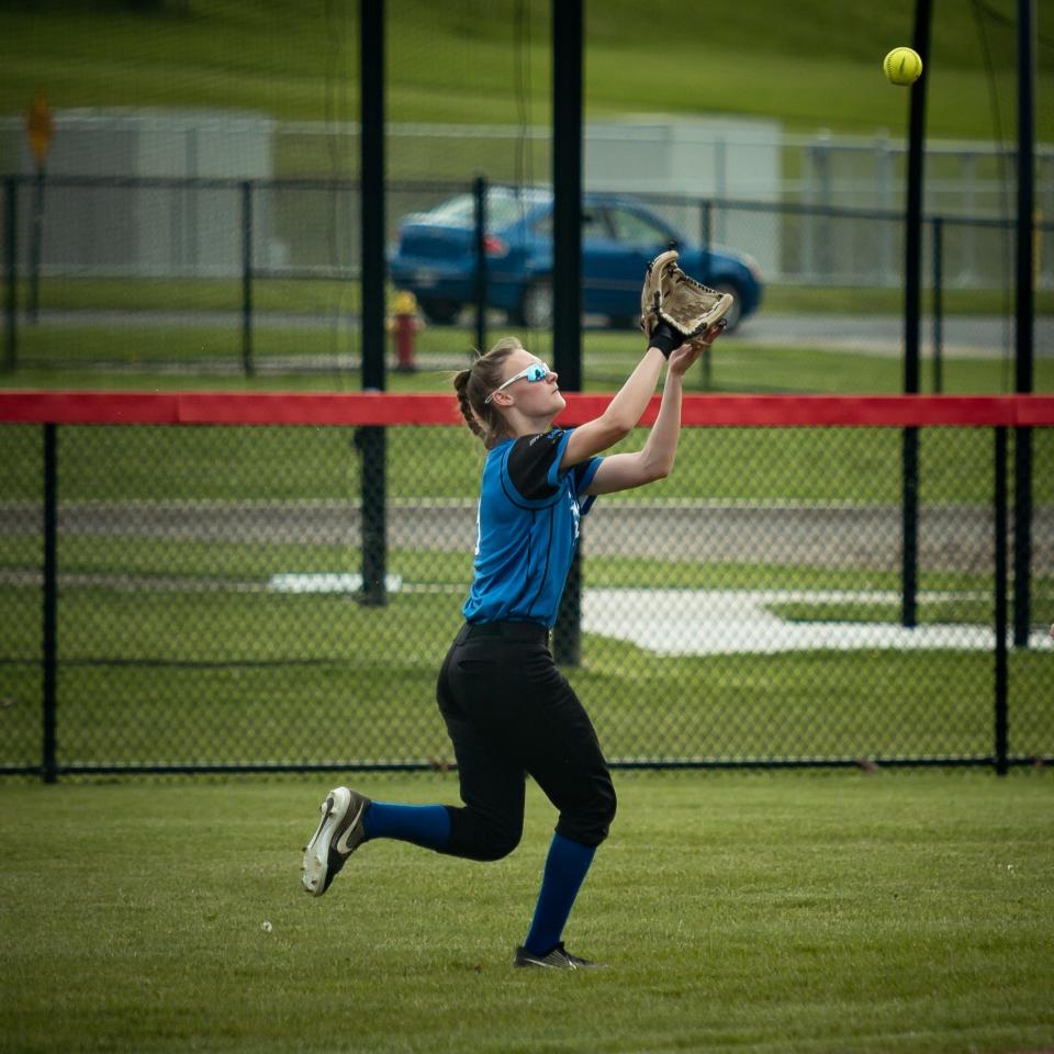 Brooke Musch gets the out in center field from a pop up for Camden during their game against Proctor at Thomas R. Proctor High School in Utica on Friday, May 20, 2022.