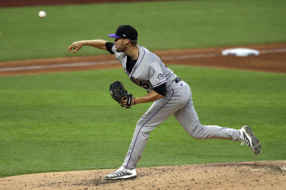 Colorado Rockies pitcher Daniel Bard delivers in the fifth inning against the Texas Rangers in a baseball game Saturday, July 25, 2020, in Arlington, Texas. (AP Photo/Richard W. Rodriguez)