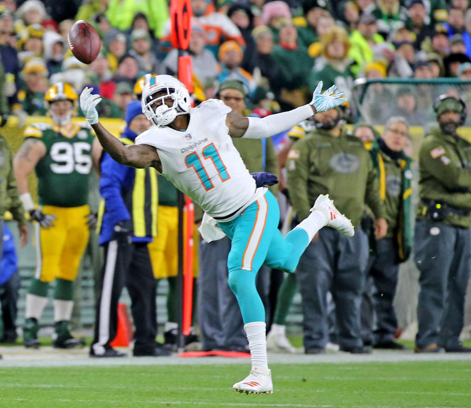 <p>Miami Dolphins’ DeVante Parker misses a pass in the final seconds of the second quarter against the Green Bay Packers on Sunday, Nov. 11, 2018 at Lambeau Field in Green Bay, Wis. (Charles Trainor Jr./Miami Herald/TNS) </p>