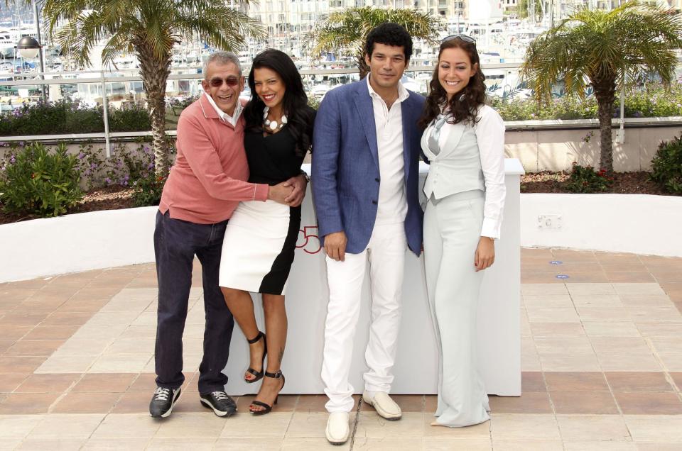 Cast members from left, Director Yousry Nasrallah, Nahed El Sebai, Bassem Samra and Menna Shalaby during a photo call for After the Battle at the 65th international film festival, in Cannes, southern France, Thursday, May 17, 2012. (AP Photo/Joel Ryan)