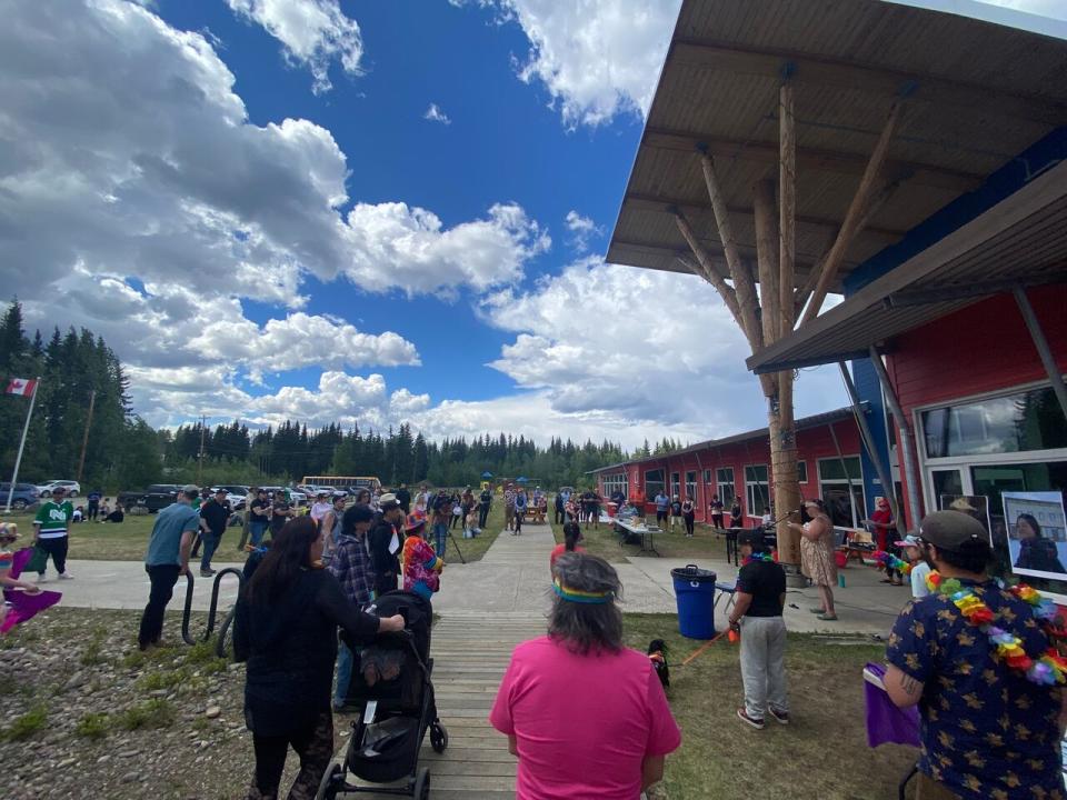 Dozens of people gathered at the J.V. Clarke School for the pride parade and a barbecue to celebrate the 2SLGBTQ+ community. (Chris MacIntyre/CBC)