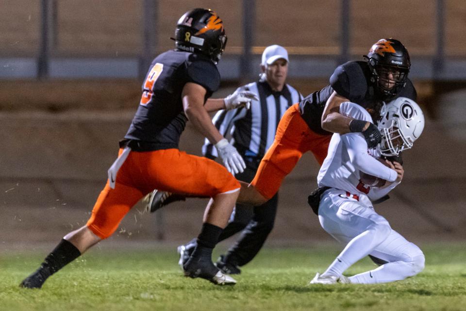 Apple Valley's Keenan Eck sacks Glendora's Jake Denerson during the second round of the CIF-Southern Section Division 3 playoffs on Nov. 13, 2021.