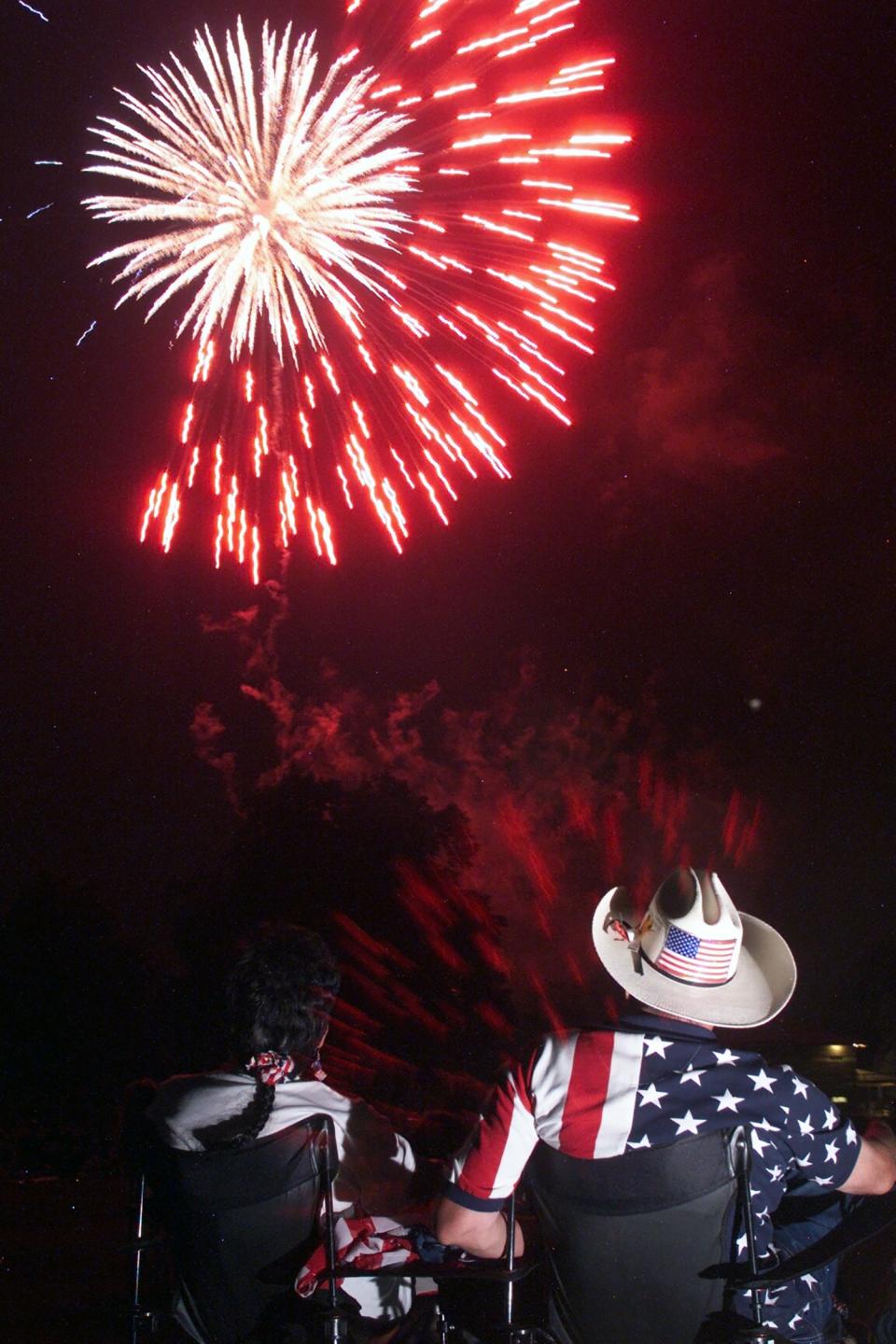 Arline Kellenbrun of Ridgefield and her husband Bob watch the fireworks display at Foschini Park in Hackensack , July 4, 2002. She is vice president of the American Legion Auxilary of Bergen County and he is vice county commander.