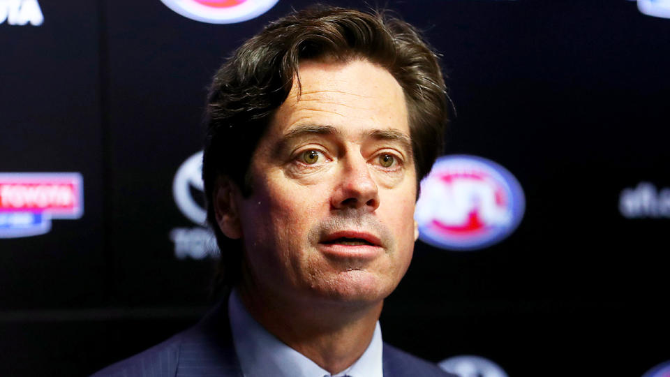 AFL CEO Gillon McLachlan, pictured during a press conference, says the league is ready to play games without fans in attendance.