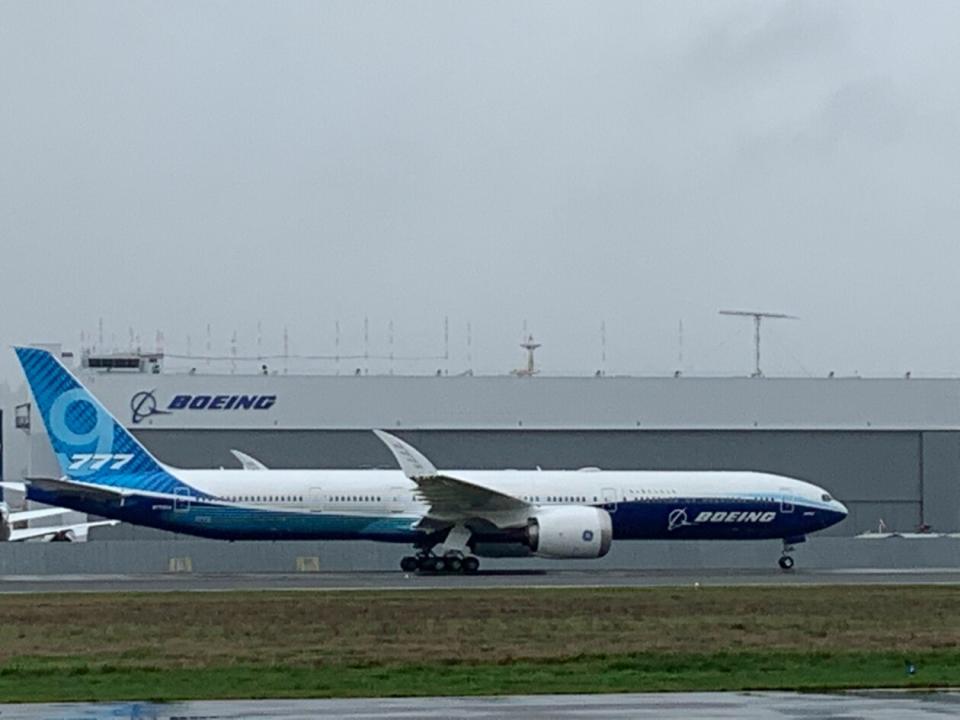 Boeing 777X taxis on runway