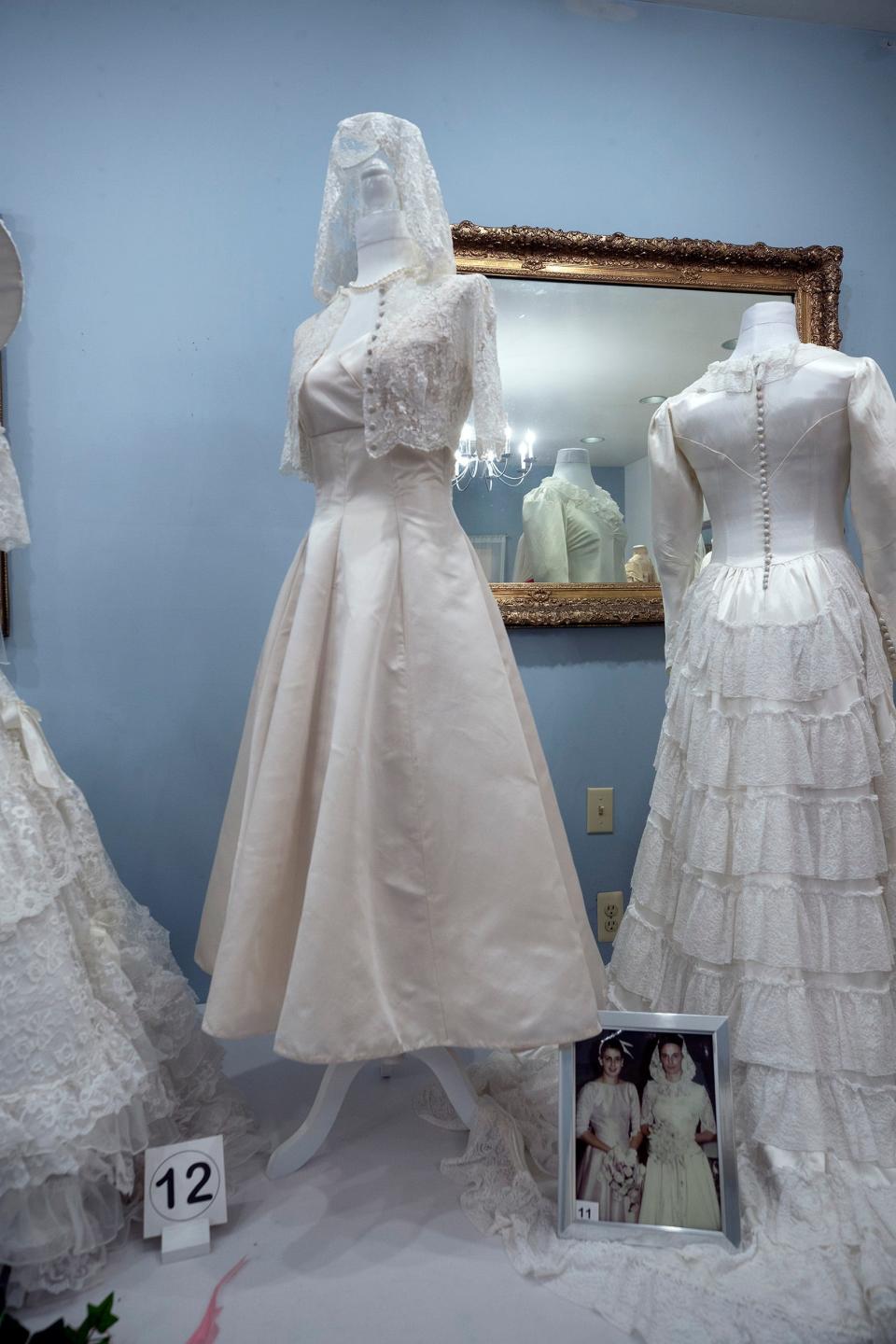 The wedding dress (center) of Emilia Siciliano, Shrewsbury's former mayor, exhibited at the Shrewsbury Historical Society.