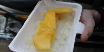 <b>Mango Sticky Rice, Thailand</b> Noodles are also a go-to on the streets of Thailand but you can’t go past the delicious and convenient bags of sweet rice, coconut cream and fresh mango for a treat.