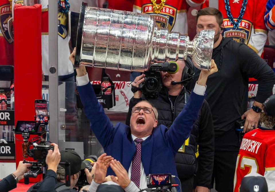 Florida Panthers head coach Paul Maurice lifts the Stanley Cup after the Panthers defeated the Edmonton Oilers in Game 7 of the NHL Stanley Cup Final at the Amerant Bank Arena on Monday, June 24, 2024, in Sunrise, Fla.