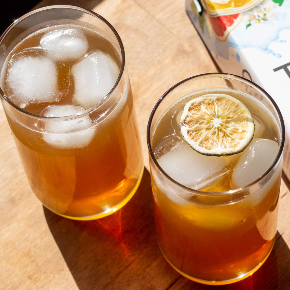 two glasses of iced green tea with lime