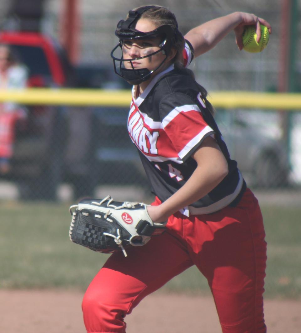 Onaway's Layla Box winds up and throws during game one of Tuesday's softball doubleheader at Inland Lakes.