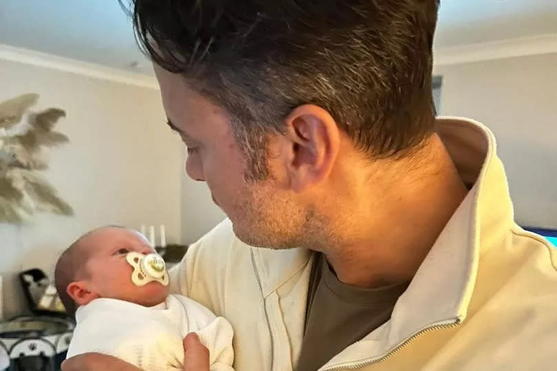 Actor Gary Lucy with his baby daughter Bonnie