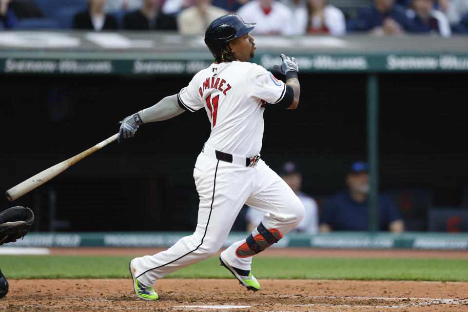 Cleveland Guardians' José Ramírez watches his RBI single off Chicago White Sox pitcher Tim Hill during the fourth inning of a baseball game, Tuesday, April 9, 2024, in Cleveland. (AP Photo/Ron Schwane)