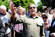 <b>Protests</b><br>Renowned American radio host and conspiracy theorist Alex Jones met with the media outside the conference, which he declared "a cesspit of globalist turds."