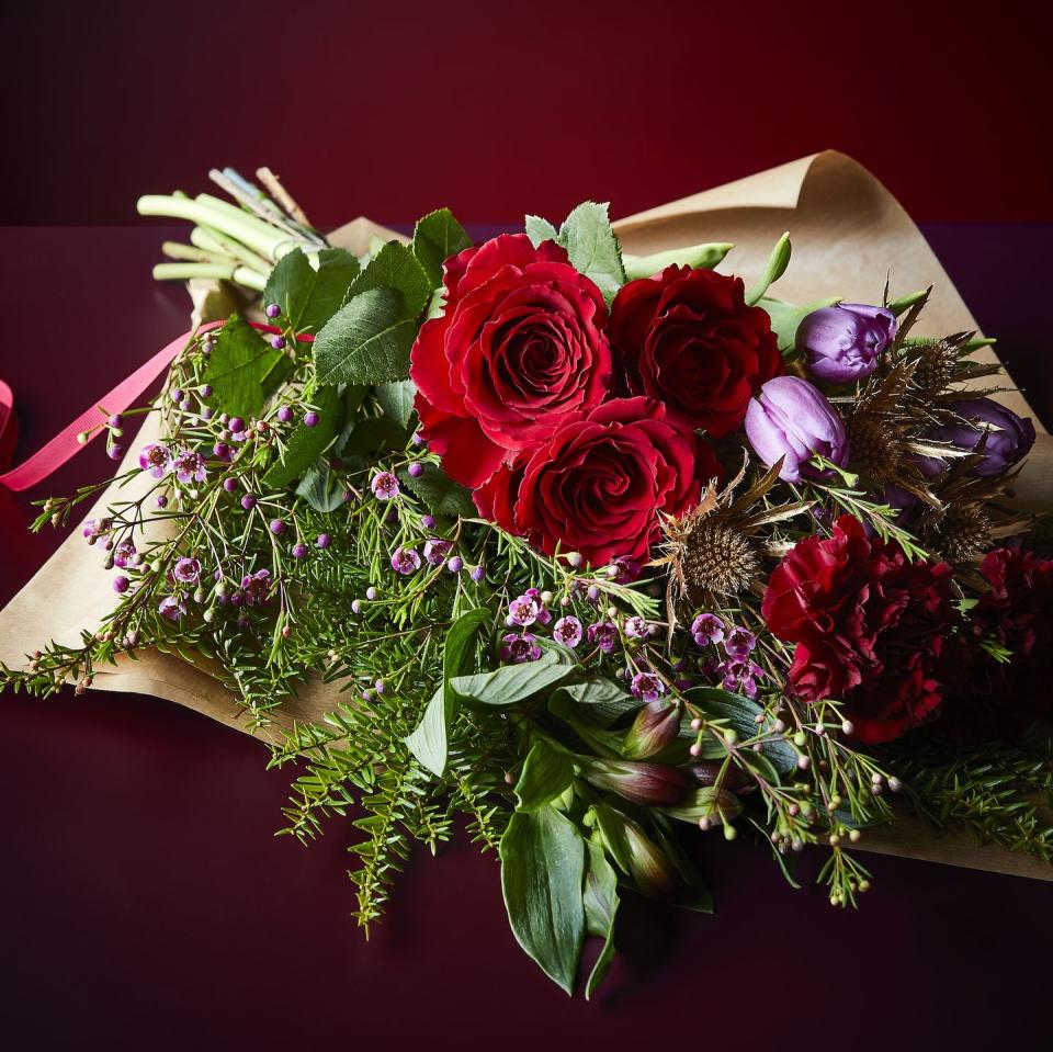 <p>Post some flowers to a loved one with these beautiful Christmas blooms. It features an abundance of red and purple festive flowers and scented foliages – there's even a step-by-step guide on how to arrange them to look their best.</p>