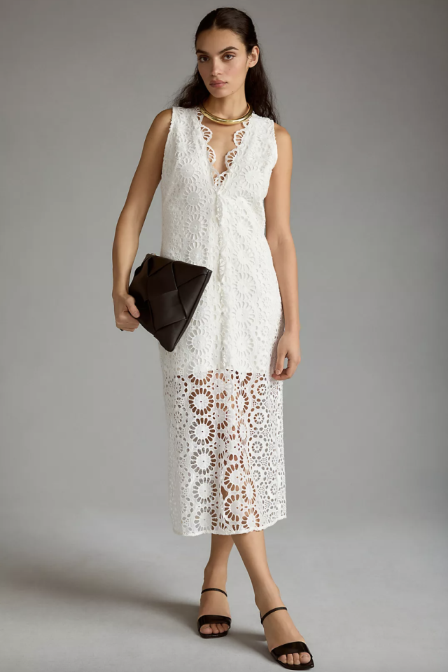 brunette model wearing white Maeve Sleeveless Eyelet Dress (photo via Anthropologie)