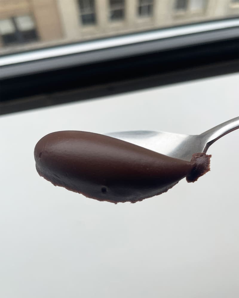 Jif peanut butter and chocolate spread on spoon.