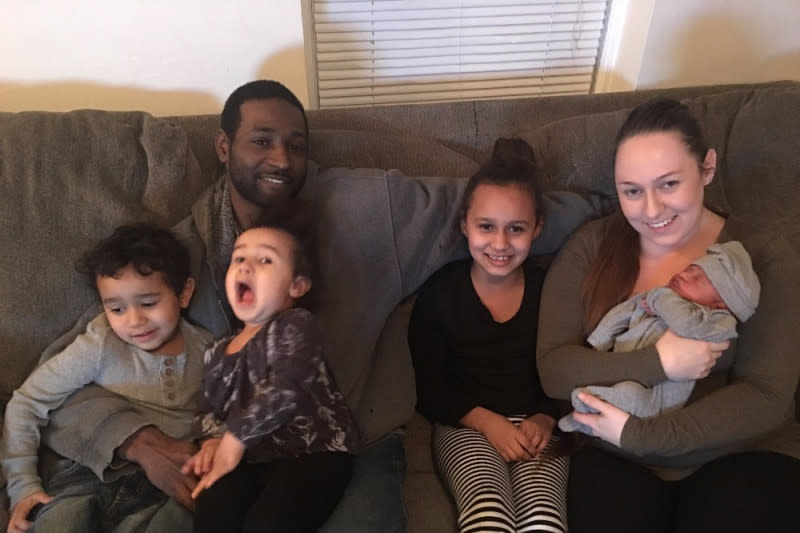 Lamar Austin junto a su mujer y sus cuatro hijos