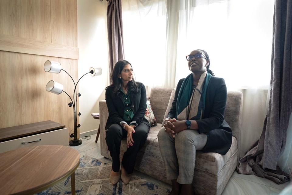 Braverman visits a newly built house with Rwandan minister Claudette Irere (PA)