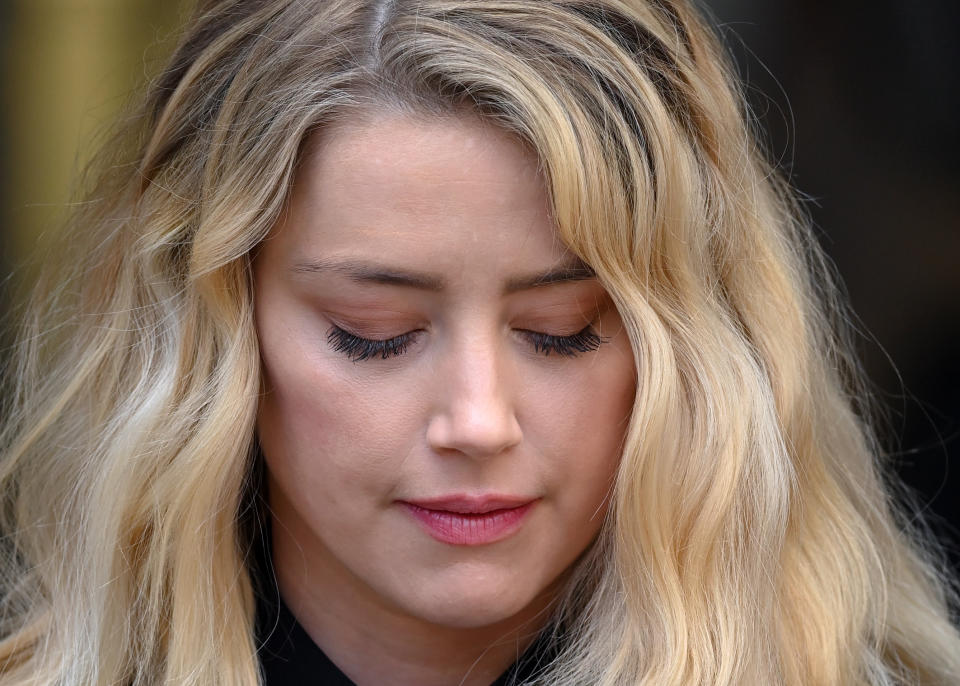LONDON, ENGLAND - JULY 28: Amber Heard gives a statement after the libel case at the Royal Courts of Justice, the Strand on July 28, 2020 in London, England. Hollywood Actor Johnny Depp is suing News Group Newspapers (NGN) and the Sun's executive editor, Dan Wootton, over an article published in 2018 that referred to him as a 