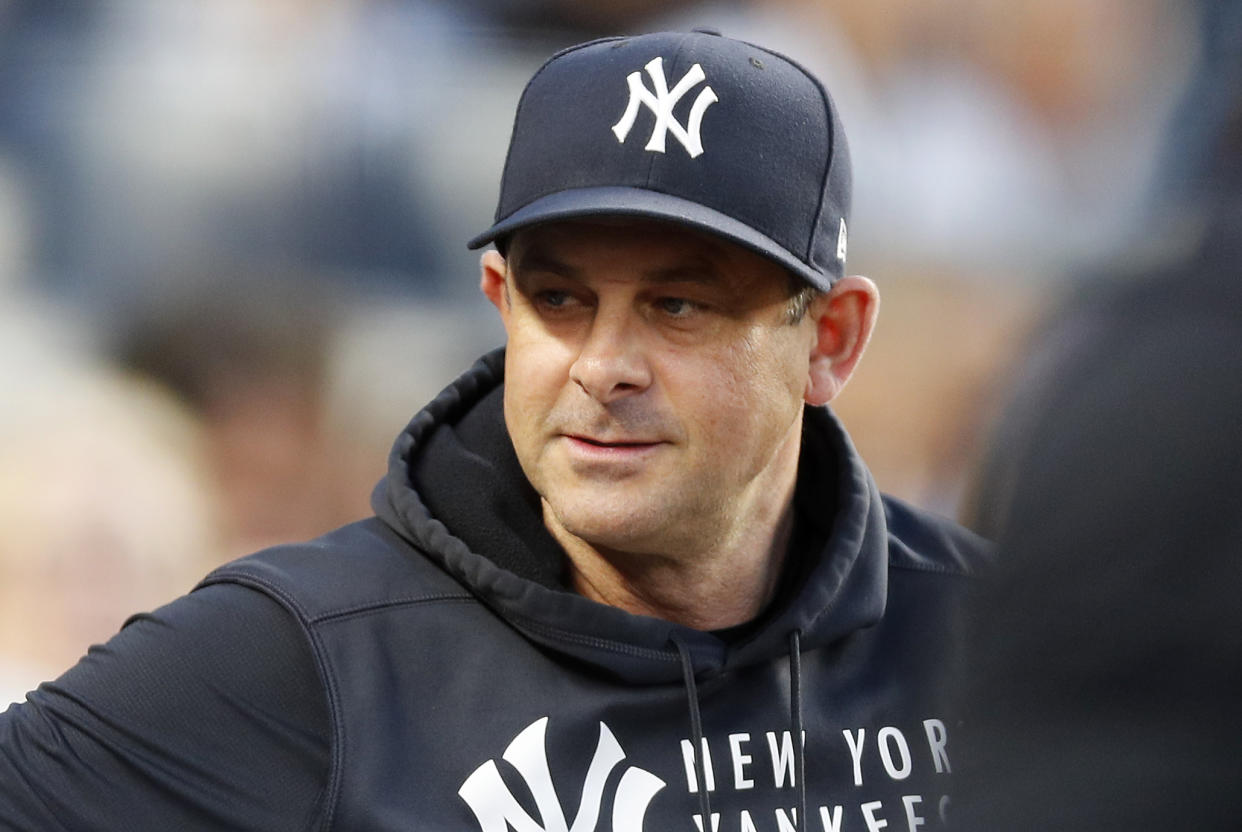 NEW YORK, NEW YORK - AUGUST 16:  (NEW YORK DAILIES OUT)  Manager Aaron Boone #17 of the New York Yankees looks on against the Los Angeles Angels at Yankee Stadium on August 16, 2021 in New York City. The Yankees defeated the Angels 2-1. (Photo by Jim McIsaac/Getty Images)