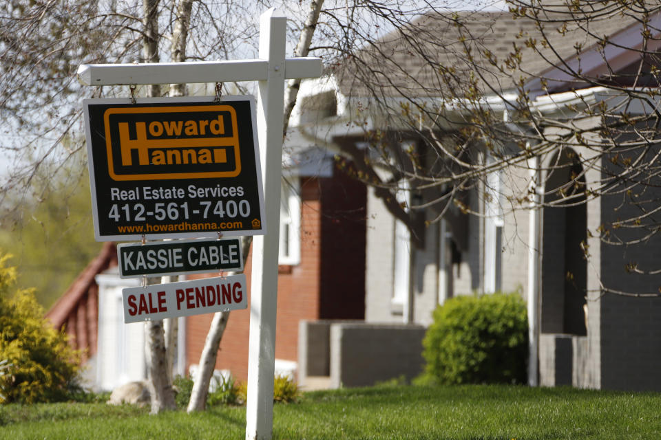 FILE - This Monday, April 27, 2020, file photo shows a sale pending sign on a home in Mount Lebanon, Pa. The coronavirus pandemic helped shape the housing market by influencing everything from the direction of mortgage rates to the inventory of homes on the market to the types of homes in demand and the desired locations. (AP Photo/Gene J. Puskar, File)