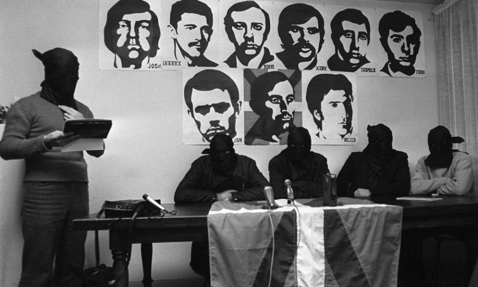 Hooded ETA members hold a press conference in southern France after Luis Carrero Blanco’s death.