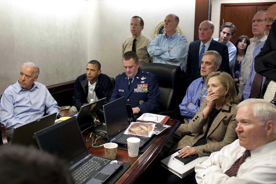 FILE - In this May 1, 2011 file image released by the White House and digitally altered by the source to diffuse the paper in front of Secretary of State Hillary Clinton, President Barack Obama and Vice President Joe Biden, along with members of the national security team, receive an update on the mission against Osama bin Laden in the Situation Room of the White House in Washington. (Pete Souza/The White House via AP, File)