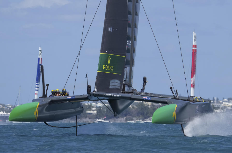 In this photo provided by SailGP, Australia SailGP Team helmed by Tom Slingsby competes during the Bermuda SailGP in Hamilton, Bermuda, on Friday, April 23, 2021. Slingsby and defending champion Team Australia won all three fleet races Friday on Bermuda's Great Sound in an impressive performance on the first day of the second season of the SailGP global league. (Thomas Lovelock/SailGP via AP)