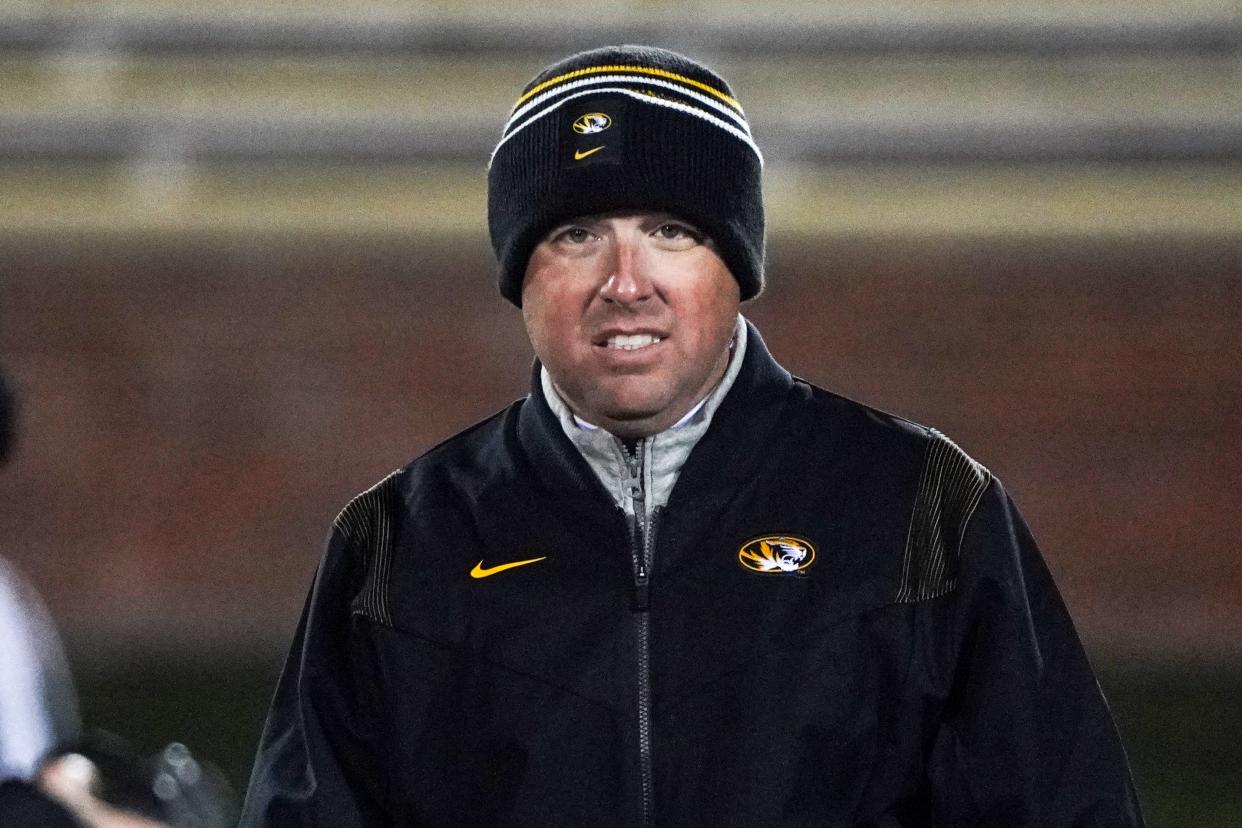 Nov 19, 2022; Columbia, Missouri, USA; Missouri Tigers head coach Eli Drinkwitz watches team warm ups against the New Mexico State Aggies prior to a game at Faurot Field at Memorial Stadium.