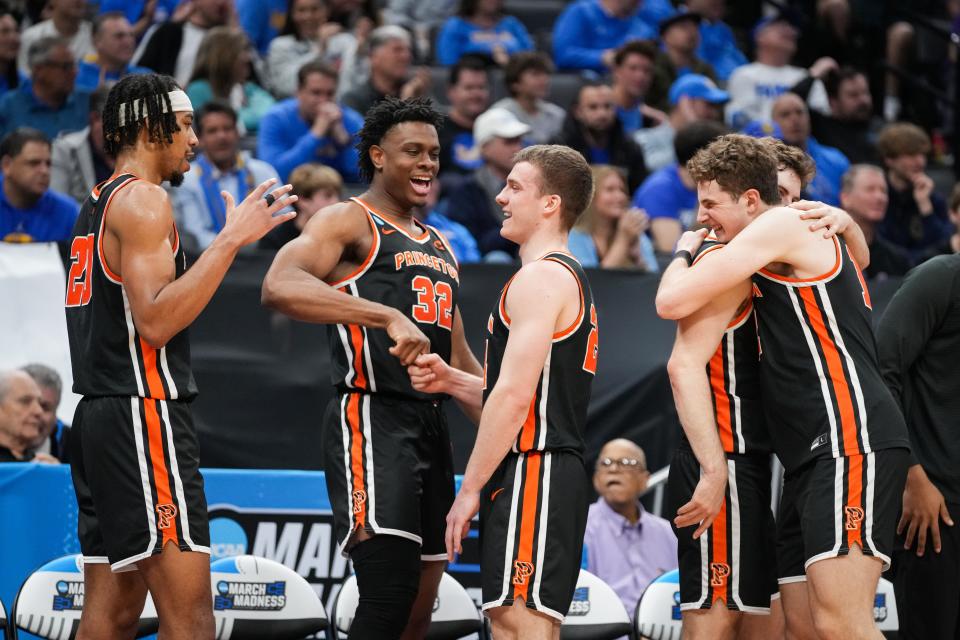 Mar 18, 2023; Sacramento, CA, USA; The Princeton Tigers react as substitutions are made late during the second half prior to defeating the Missouri Tigers at Golden 1 Center.