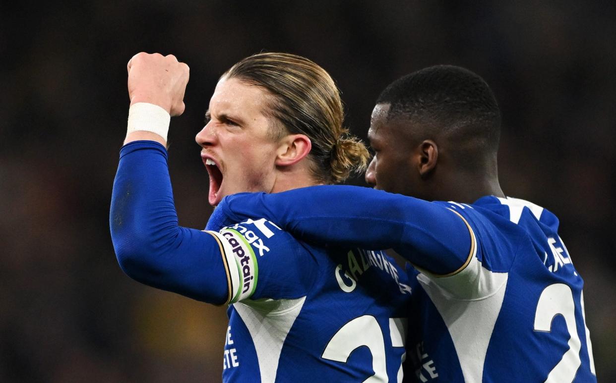 Conor Gallagher of Chelsea celebrates scoring his team's second goal with teammate Moises Caicedo during the Premier League match between Aston Villa and Chelsea FC at Villa Park on April 27, 2024 in Birmingham, England