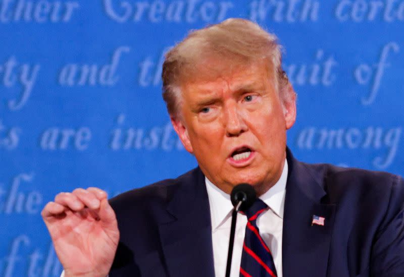 U.S. President Donald Trump and Democratic presidential nominee Joe Biden participate in their first 2020 presidential campaign debate in Cleveland