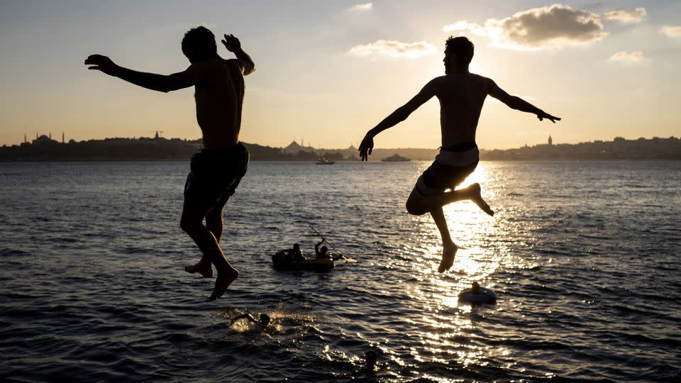Men jump into the waters of the Bosphorus at the Anatolian side, also known as the Asian side, of Istanbul. Males around the world have a higher drowning risk than that of females. - Moe Zoyari/Bloomberg/Getty Images