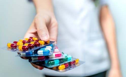 <span class="caption">Some estimates suggest antimicrobial resistance could cause 10 million deaths per year by 2050. </span> <span class="attribution"><a class="link " href="https://www.shutterstock.com/image-photo/pharmacist-doctor-hand-holding-pack-antibiotic-1444962308" rel="nofollow noopener" target="_blank" data-ylk="slk:Fahroni/ Shutterstock;elm:context_link;itc:0;sec:content-canvas">Fahroni/ Shutterstock</a></span>