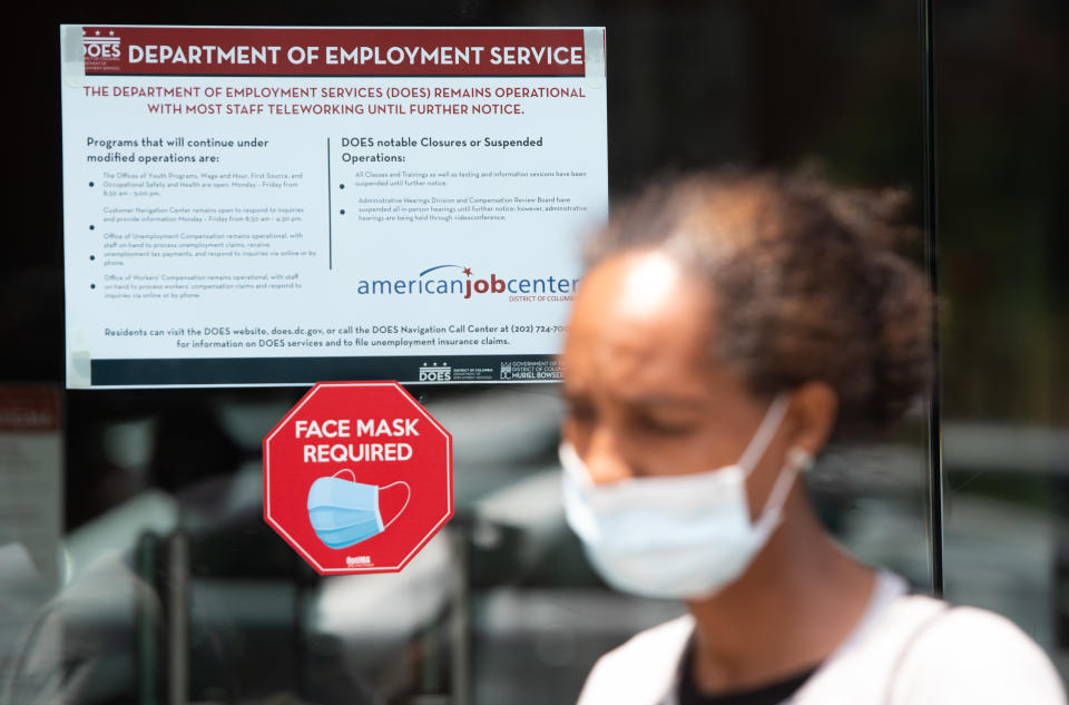 Diana Yitbarek, 44, of Washington, DC, leaves the DC Department of Employment Services, after trying to find out about her unemployment benefits in Washington, DC, July 16, 2020. - Americans worry as unemployment benefits are due to end soon. (Photo by SAUL LOEB / AFP) (Photo by SAUL LOEB/AFP via Getty Images)