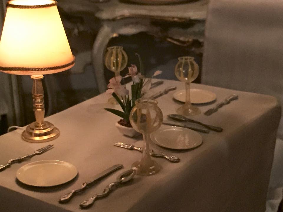 An closer look of a table setting of La Cote Basque, the diorama artist Jamie Wyeth created in 2013. It was on display at the Brandywine Museum of Art in 2015.