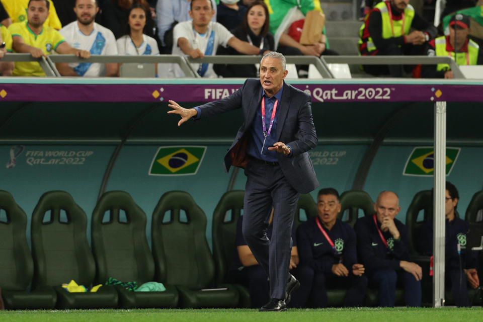 Brazil's coach #00 Tite shouts instructions to his players from the touchline during the Qatar 2022 World Cup quarter-final football match between Croatia and Brazil at Education City Stadium in Al-Rayyan, west of Doha, on December 9, 2022. (Photo by Adrian DENNIS / AFP) (Photo by ADRIAN DENNIS/AFP via Getty Images)