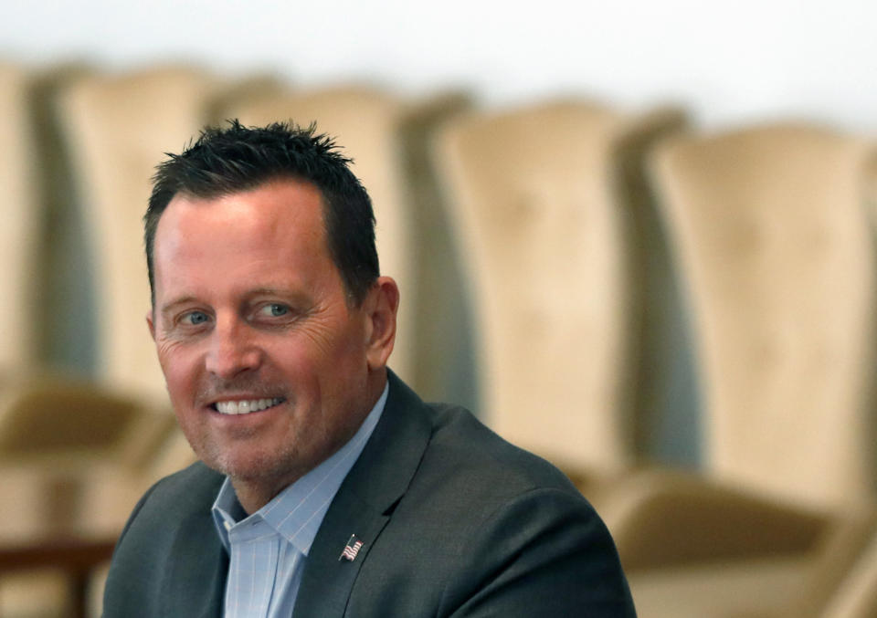 US President Donald Trump's envoy for Serbia-Kosovo talks Richard Grenell smiles as he takes part in a meeting with Serbian President Aleksandar Vucic at the Serbia Palace in Belgrade, Serbia, Tuesday, Sept. 22, 2020. Trump's administration has been working to normalize relations between Serbia and Kosovo, two former Balkan war foes, and two weeks ago Serbian President Aleksander Vucic and Kosovo Prime Minister Avdullah Hoti signed an economic normalization deal at the White House. (AP Photo/Darko Vojinovic)