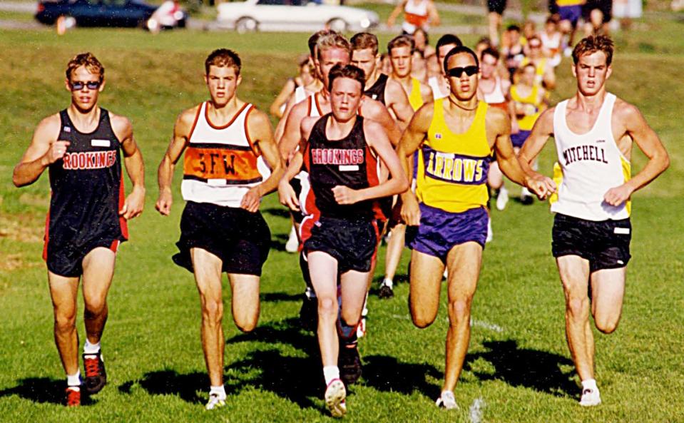 Watertown's Phil Davis (second from right) battles runners, from left, Travis Welk of Brookings, Ryan Mertz of Sioux Falls Washington, Eric Vaughn of Brookings and Tyler DeJong of Mitchell on the way to winning a home cross country in the fall of 1997 at Lincoln Elementary.