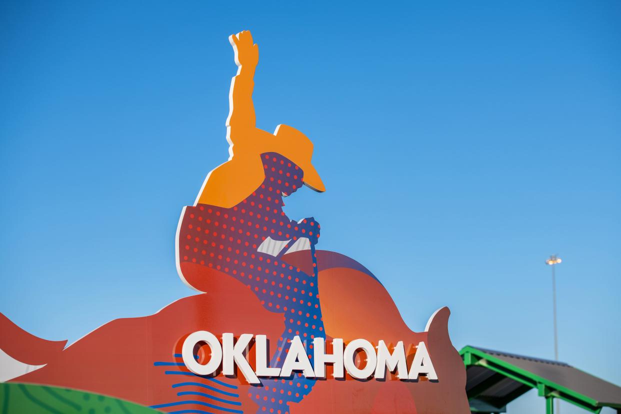 A sign welcomes visitors to the Travel Information Center at NE 122 and Interstate 35 in Oklahoma City.