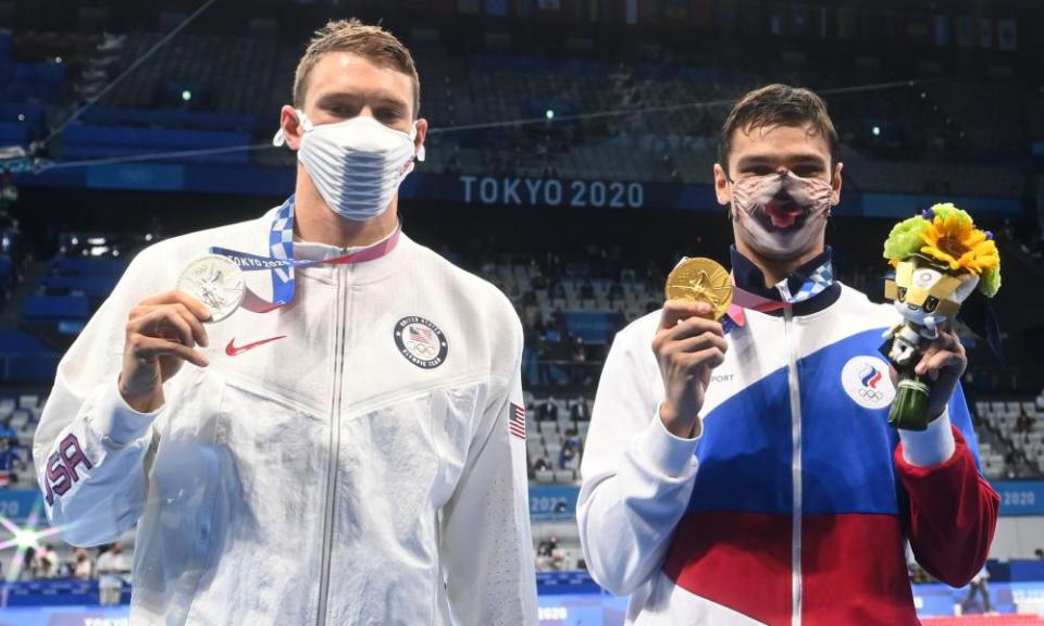 Ryan Murphy (left), silver medallist in the men’s 200m backstroke gold medallist, said after the ROC’s Evgeny Rylov (right) took gold: ‘I’m swimming in a race that’s probably not clean.’