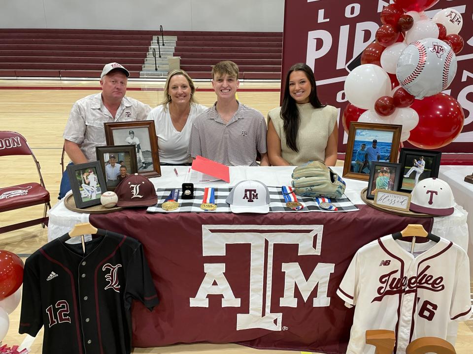 London's Blayne Lyne made his Division I baseball signing with Texas A&M official on Wednesday at the London High School Gymnasium.